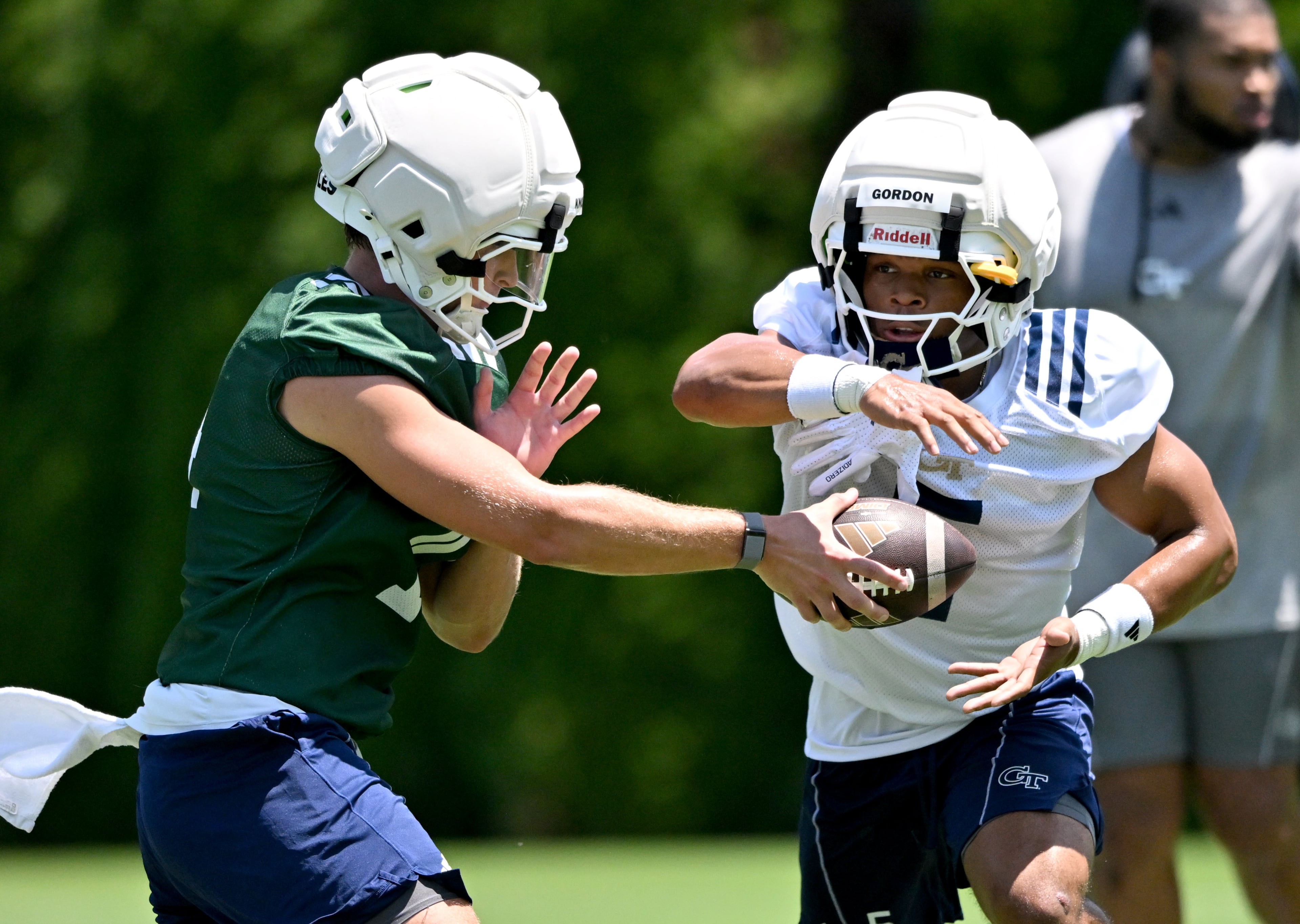 Georgia Tech quarterback Graham Knowles (left) and Georgia Tech runningback Daylon Gordon (5) run a drill during the first day of football practice at Rose Bowl Field and the Mary and John Brock Football Practice Facility, Tuesday, July 29, 2025, in Atlanta. (Hyosub Shin / AJC)