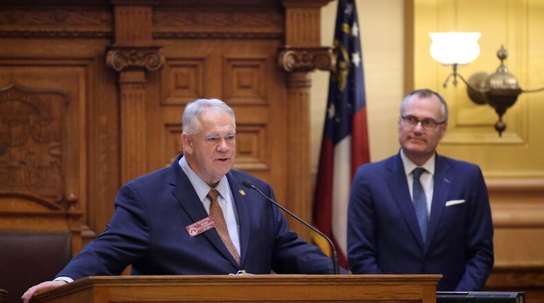 House Speaker David Ralston stands next to Lt. Gov. Casey Cagle as he addresses the state Senate on the final night of the 2018 legislative session. PHOTO / JASON GETZ