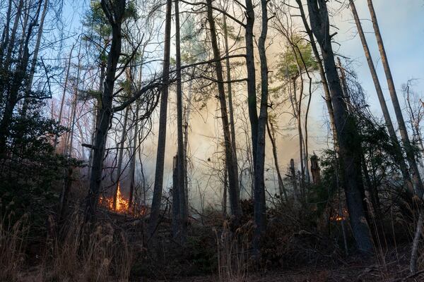 The Black Cove Fire is seen burning Wednesday, March 26, 2025, in Saluda, N.C. (AP Photo/Allison Joyce)