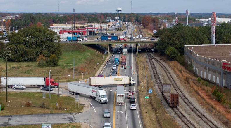 November 27, 2019 McDonough - Aerial photography shows Georgia State Route 155 (vertical, heading northeast) and Interstate 75 (horizontal) on Wednesday, November 27, 2019. For years, Henry County leaders basked in the glory of being one of fastest growing communities in the nation. But while they were toasting their success, they weren’t keeping an eye on the longterm impact of adding so many people. Now, the county is a congestion mess and is spending millions in a race to untangle its infrastructure before things gets worse.(Hyosub Shin / Hyosub.Shin@ajc.com)