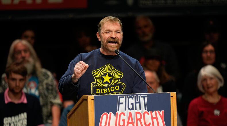 Graham Platner, Democratic candidate for U.S. Senate, speaks at an event hosted by Sen. Bernie Sanders in Orono, Maine, Sunday, May 24, 2026. (AP Photo/Robert F. Bukaty)