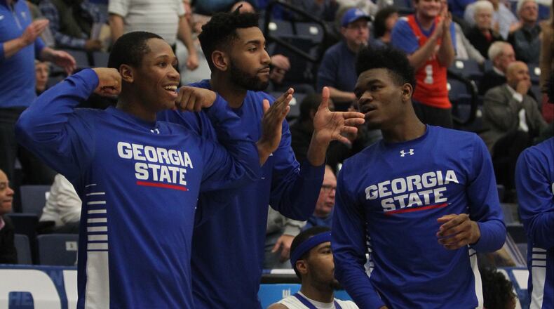 GSU players celebrate. (HENRY TAYLOR / HENRY.TAYLOR@AJC.COM)