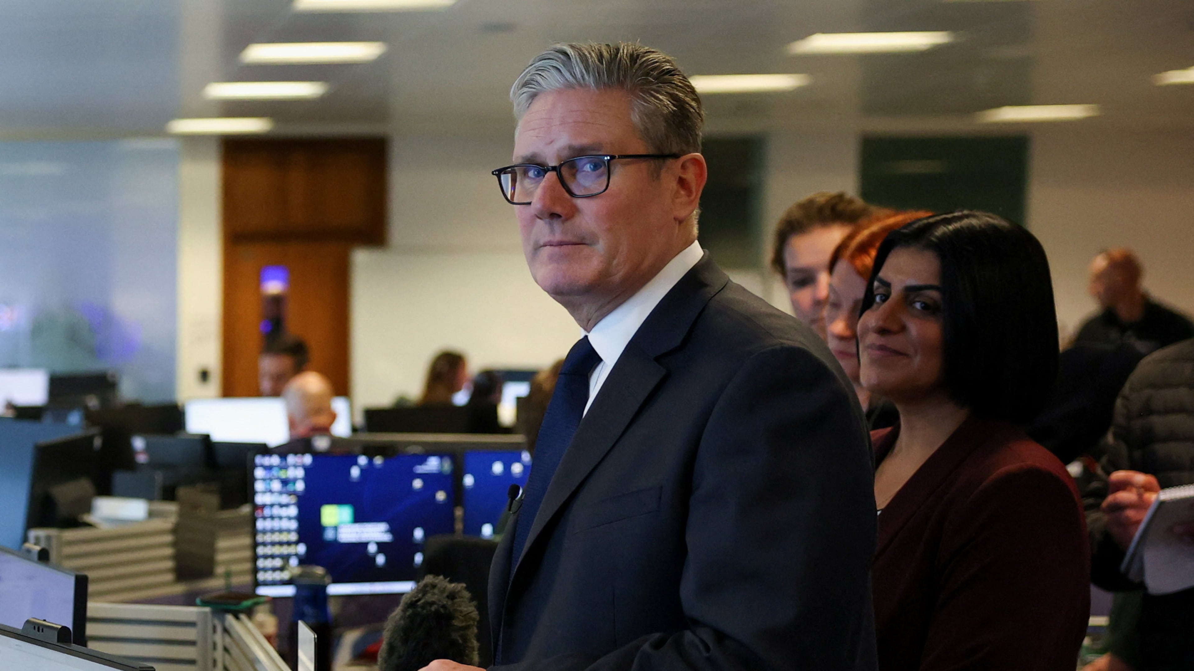 Britain's Prime Minister Keir Starmer and Home Secretary Shabana Mahmood visit the Greater Manchester Police headquarters in Manchester, England, Friday, Oct. 3, 2025, after multiple people were killed Thursday on Yom Kippur in what police have declared a terrorist incident. (Phil Noble/Pool Photo via AP)