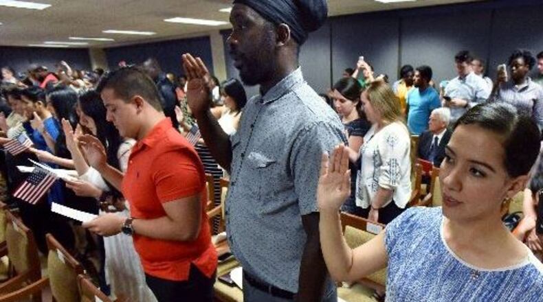 Gwinnett County and the Gwinnett County School District say they provide many services to immigrants and other minorities. HYOSUB SHIN/HSHIN@AJC.COM