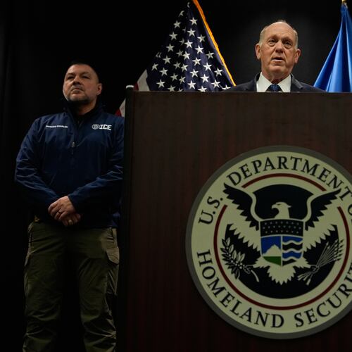 White House border czar Tom Homan holds a news conference as Marcos Charles and Rodney Scott, listen, at the Bishop Whipple Federal building on Thursday, Jan. 29, 2026 in Minneapolis. (AP Photo/Julia Demaree Nikhinson)