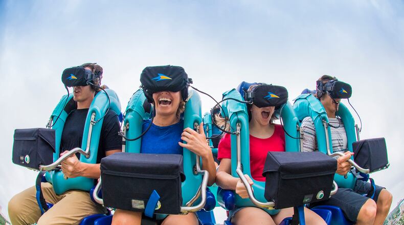 As Kraken speeds through a loop and turns upside down, its riders wearing virtual reality headsets are experiencing an undersea adventure. (SeaWorld Orlando)