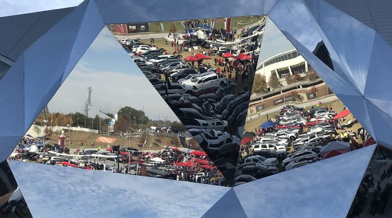 Kirk Campbell sent in this Mercedes Benz Dome soccer ball reflection of the Home Depot back yard and the sky on Falcons game day.