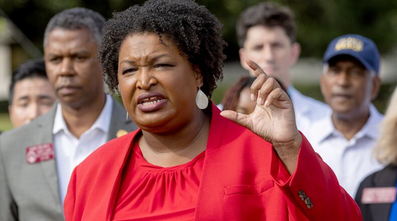 Stacey Abrams and other top Democrats are including Forsyth County in campaign stops. She is pictured speaking at a news conference in Atlanta on Sep. 2, 2022. Steve Schaefer/steve.schaefer@ajc.com)