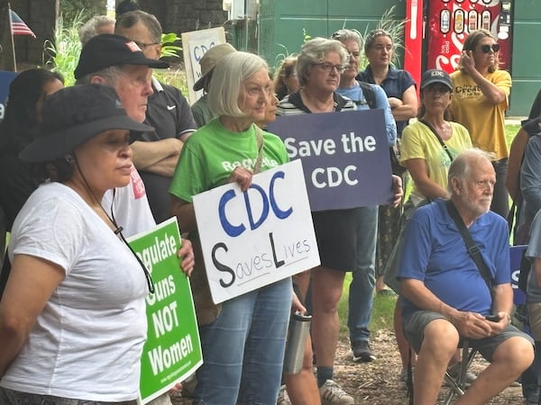 More than 50 people attend the rally in Atlanta's Piedmont Park on Sunday, Aug. 10, 2025, two days after a gunman opened fire at the Centers for Disease Control and Prevention. (David Aaro/AJC)