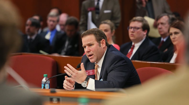Feg. 12, 2015 - Atlanta - Rep. Jay Roberts presents a revised House plan to raise $1 billion for transportation to the full Transportation Committee. House Bill 170 has also garnered new critics as the Sierra Club denounced its lack of funding for transit and it's creation of a new user fee on electric vehicle drivers while a Washington think-tank and a Republican House member unveiled a study that showed eliminating a state tax credit for the purchase of electric vehicles would cost the state more than $200 million in lost GDP over the next 16 years. BOB ANDRES / BANDRES@AJC.COM Jay Roberts, R-Ocilla, presents a revised House plan to raise $1 billion for transportation to the full House Transportation Committee on Thursday. Bob Andres, bandres@ajc.com