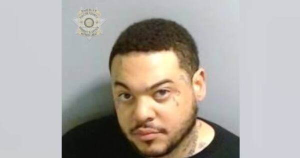 Malik Jones is charged with murder in connection with the killing in northeast Atlanta, police said. 