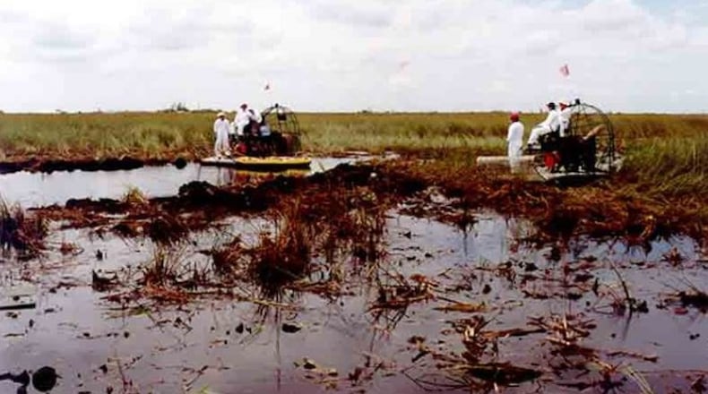 Recovery personnel work at the crash site of ValuJet Flight 592. (Photo: FAA)