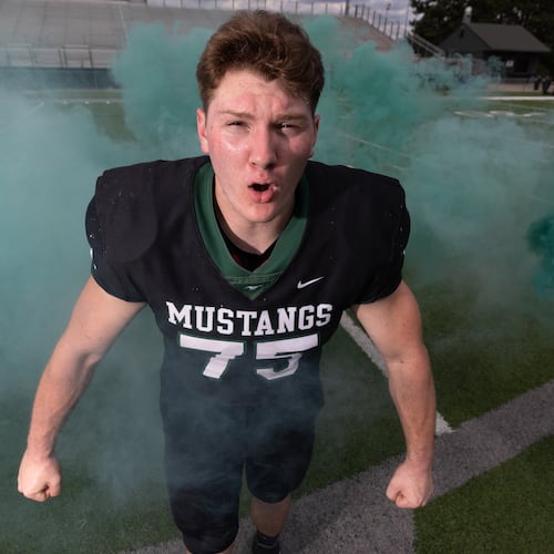 Connor Lew, an AJC Super 11 pick in 2022, became Kennesaw Mountain's first NFL draft pick last week when the Bengals selected him in the fourth round. He played for Auburn. (Steve Schaefer/AJC 2022)