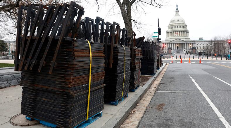WASHINGTON, DC - JANUARY 16: Stacks of security fencing are seen near the US Capitol in preparation for the upcoming inauguration of President-elect Donald Trump January 16, 2017 in Washington, DC. Authorities expect tens of thousands of supporters and protesters to descend on Washington for Friday's Inauguration ceremony. (Photo by Aaron P. Bernstein/Getty Images)