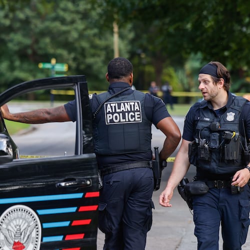 Atlanta Police work the scene near Piedmont Park's Active Oval on Sept. 9, 2026, as they investigate reports of shots fired within the park on Wednesday, Sept. 9, 2026. Police have detained two men and are searching for a third person after a dispute escalated to gunshots. (Arvin Temkar/AJC)