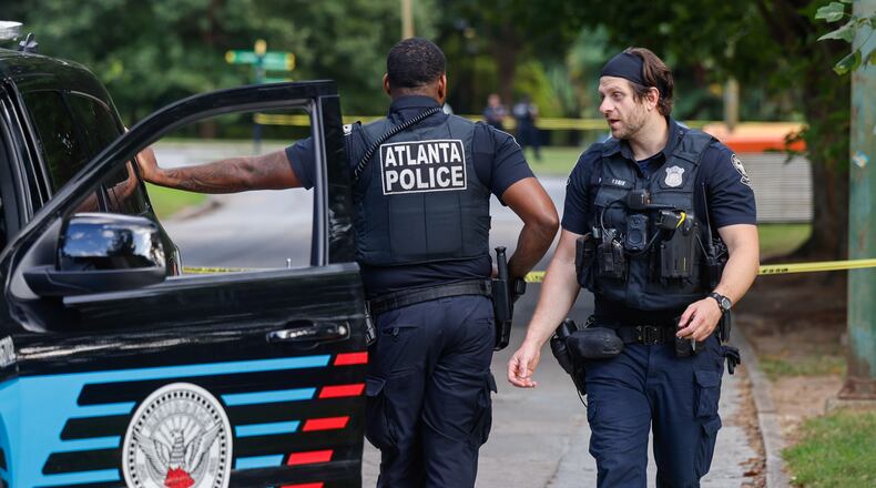 Atlanta Police work the scene near Piedmont Park's Active Oval on Sept. 9, 2026, as they investigate reports of shots fired within the park on Wednesday, Sept. 9, 2026. Police have detained two men and are searching for a third person after a dispute escalated to gunshots. (Arvin Temkar/AJC)