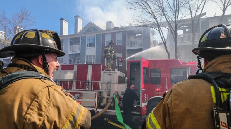 Federal grant, SPLOST passage allows DeKalb County to hire more firefighters. AJC file photo