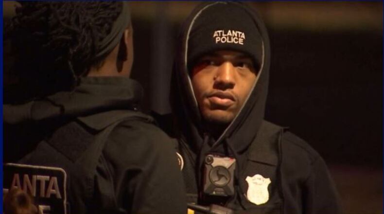 Atlanta police searched an open field Saturday night after a man was shot and killed. (Credit: Channel 2 Action News)