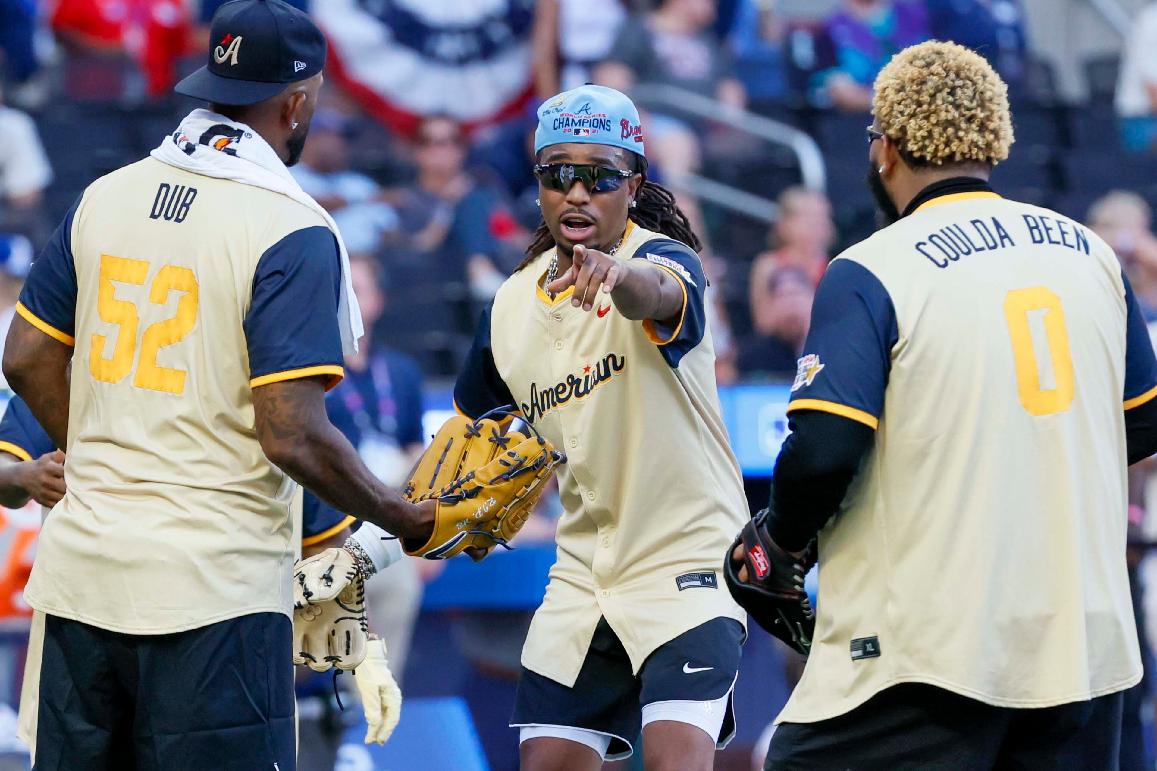 Quavo, a 4x GRAMMY-nominated rapper, interacts with teammates during the MLB All-Star Celebrity Game at Truist Park on Saturday, July 12, 2025, in Atlanta.
(Miguel Martinez/ AJC)