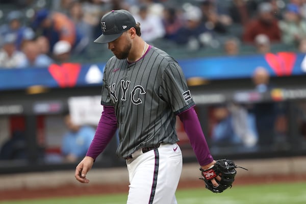 New York Mets' Tylor Megill walks to the dugout during the fourth inning of a baseball game against the Tampa Bay Rays Saturday, June 14, 2025, in New York. (AP Photo/Pamela Smith)