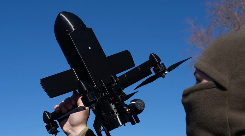 FILE - An instructor from the Ukrainian company General Cherry demonstrates the operation of an anti-air interceptor drone designed to destroy Russian attack drones in Kyiv region, on March 11, 2026. (AP Photo/Efrem Lukatsky, File)