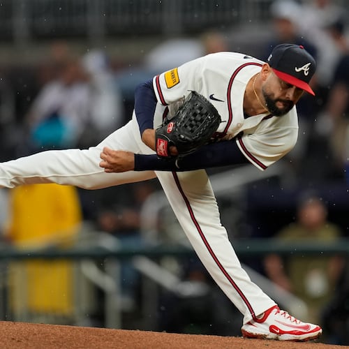 Atlanta Braves pitcher Martín Pérez (33) works against the New York Mets in the first inning of a baseball game, Tuesday, Aug. 11, 2026, in Atlanta. (AP Photo/Mike Stewart)