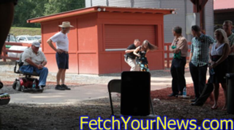 Brian Pritchchard with FetchYourNews.com captured this image of citizen-journalist Nydia Tisdale being arrested by a Dawson County sheriff’s captain for filming a political rally in August 2014. Tisdale is now standing trial for felony obstruction of an officer and two misdemeanors in Dawson County.