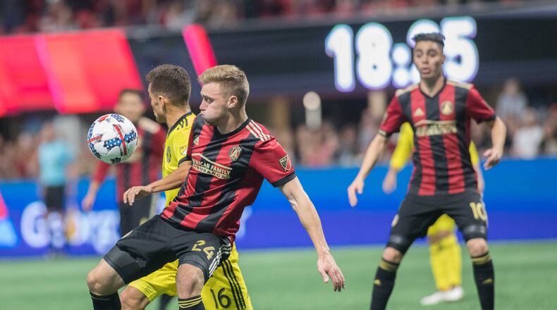 Atlanta United defender Julian Gressel (24) tries to maintain control of the ball during an MLS game against at Columbus Crew at Mercedes-Benz Stadium, Thursday, Oct. 26, 2017, in Atlanta.  BRANDEN CAMP/SPECIAL