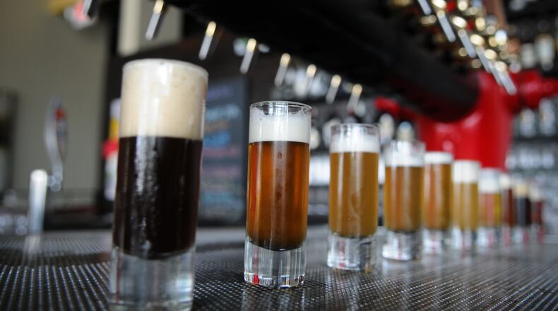 At 5 Seasons Westside, a sampling of beers: Dark White Ale, Cask Ale, Big Matt's ESB, Ga Peach Wheat, Iceboxx Watermelon Wheat Beer, Decadent Brown Ale, plan B IPA, Venus and Golden Number Ale.