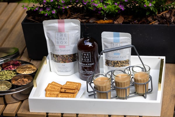 Products from the Chai Box tea company are laid out for a portrait at the home of founder Monica Sunny in Marietta on Wednesday, June 18, 2025. (Arvin Temkar/AJC)