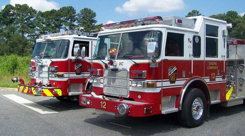 Guns were stolen from personal vehicles of Forsyth County firefighters.