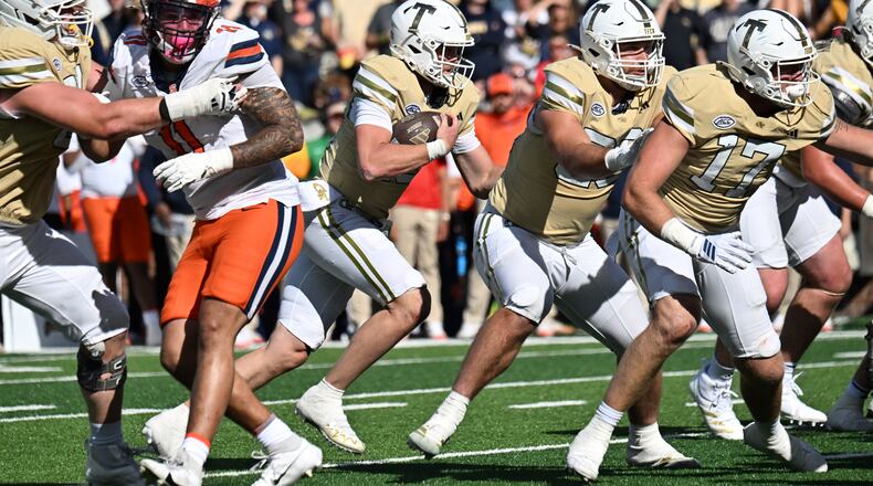 After a bye weekend, Haynes King (center) and 8-1 Georgia Tech look to get back to their winning ways at 3:30 p.m. Saturday at Boston College. (Hyosub Shin/AJC)
