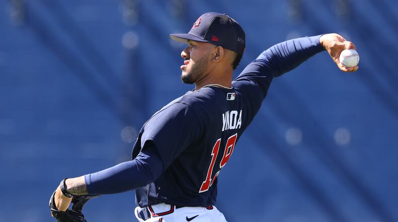 Braves pitcher Huascar Ynoa loosens up during spring training at CoolToday Park in North Port, Fla. (Curtis Compton / Curtis.Compton@ajc.com)