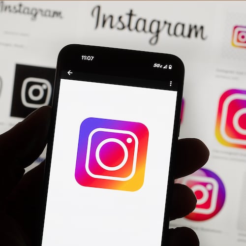 FILE - The Instagram logo is seen on a cell phone in Boston, Oct. 14, 2022. (AP Photo/Michael Dwyer, File)