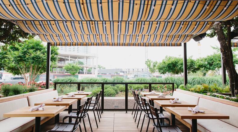 Enjoy a hogtober afternoon with a pig roast on the patio at King + Duke. Photo credit: Andrew Thomas Lee.