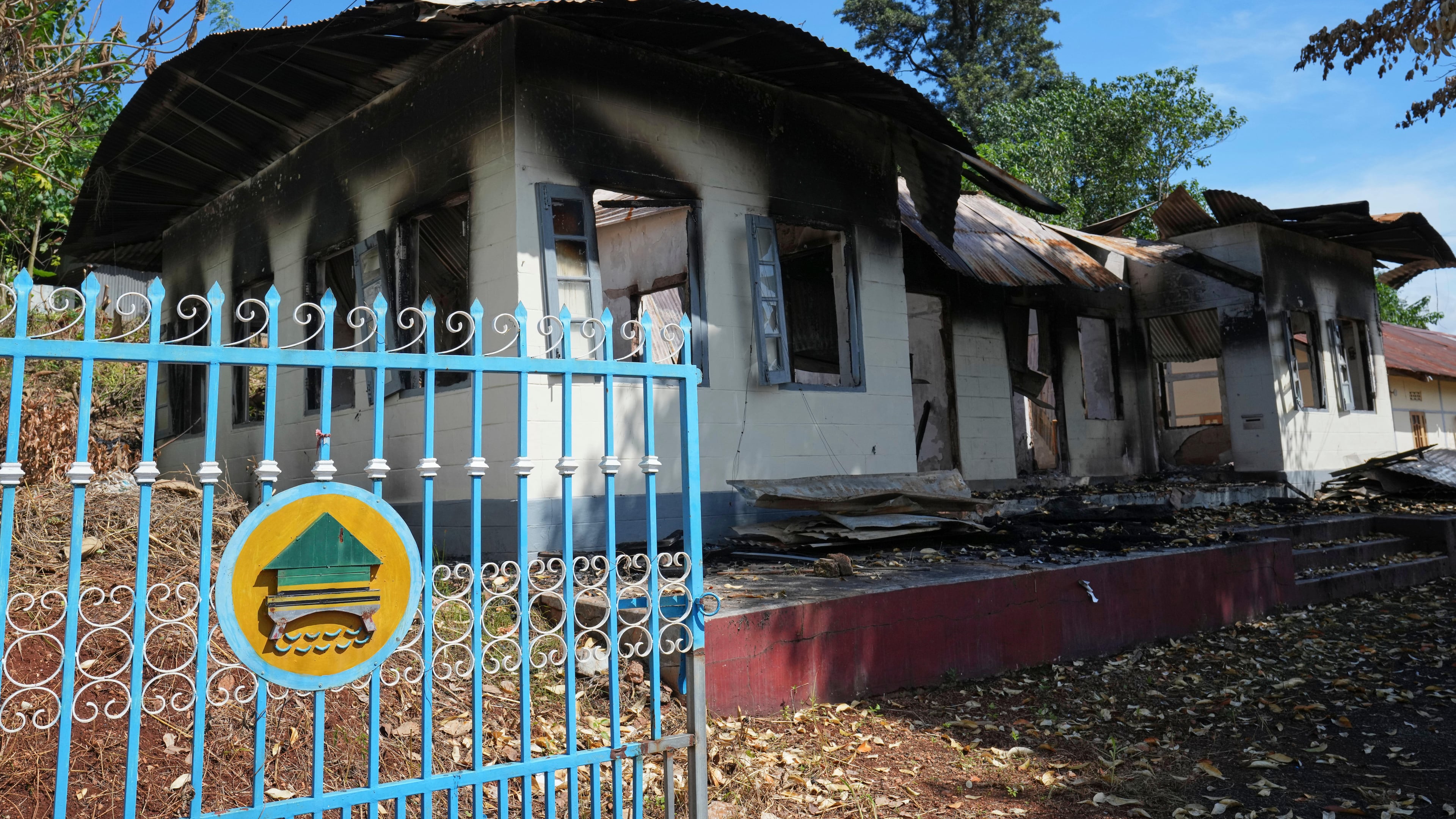 In this photo taken during a trip supervised by pro-military Myanmar media, a damaged government residence is seen in Kyaukme, northern Shan State, Myanmar, Friday, Oct. 10, 2025. (AP Photo/Aung Shine Oo)