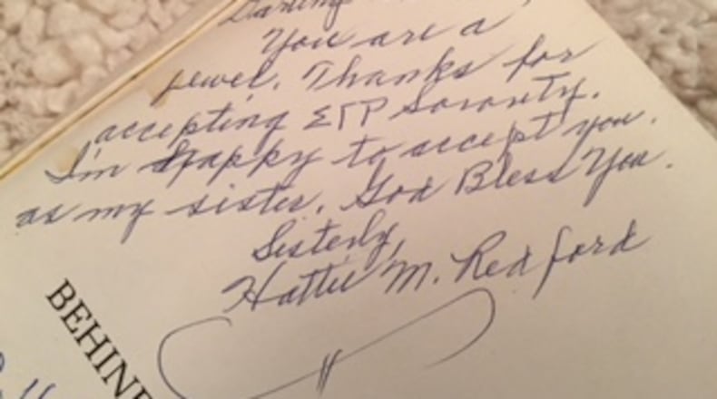 On August 6, 1976, Sigma Gamma Rho founder Hattie Redford signed the history book of young sorority member Barbara Sawyer. "Darling Barbara, you are a jewel," she wrote. "Thanks for accepting Sigma Gamma Rho Sorority. I'm happy to accept you as my sister. God Bless You! Sisterly, Hattie M. Redford."