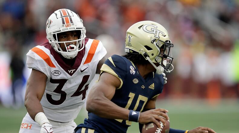 Virginia Tech linebacker Alan Tisdale pressures Georgia Tech quarterback Jeff Sims during the second half Oct. 30, 2021, in Atlanta. (AP Photo/Ben Margot)