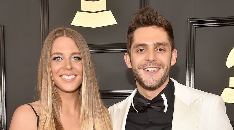 Singer Thomas Rhett and wife Lauren Akins announced that they are expecting two babies -- one is being adopted from a country in Africa and Atkins is pregnant with a child. (Photo by Alberto E. Rodriguez/Getty Images for NARAS)