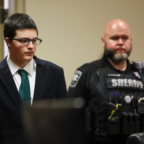 Colt Gray, the 16-year-old Apalachee High School shooting suspect, is led in by deputies for his sentencing at Barrow County Superior Court, Monday, July 27, 2026, in Winder, Ga. (Jason Getz/Atlanta Journal-Constitution via AP, Pool)