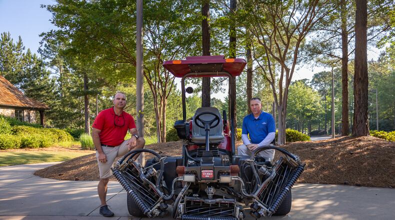 Hoyt Ellspermann (L), the superintendent at The Creek Club at Reynolds Lake Oconee, and Shannon Bowling (R), a retired veteran and graduate of the Operation Double Eagle program.
