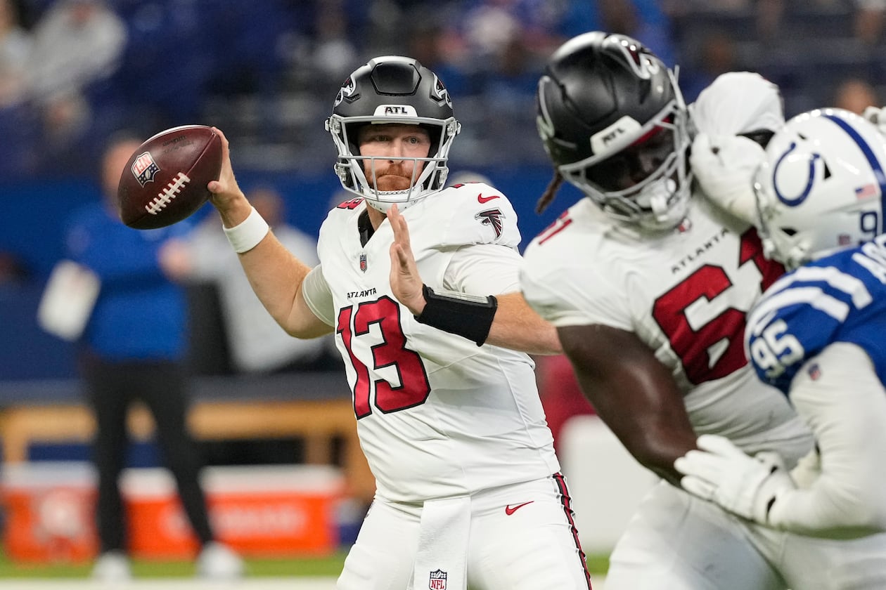 Atlanta Falcons quarterback Cooper Rush (13) throws against the Indianapolis Colts during the first half of an NFL football game in Indianapolis, Saturday, Aug. 22, 2026. (Nam Y. Huh/AP)