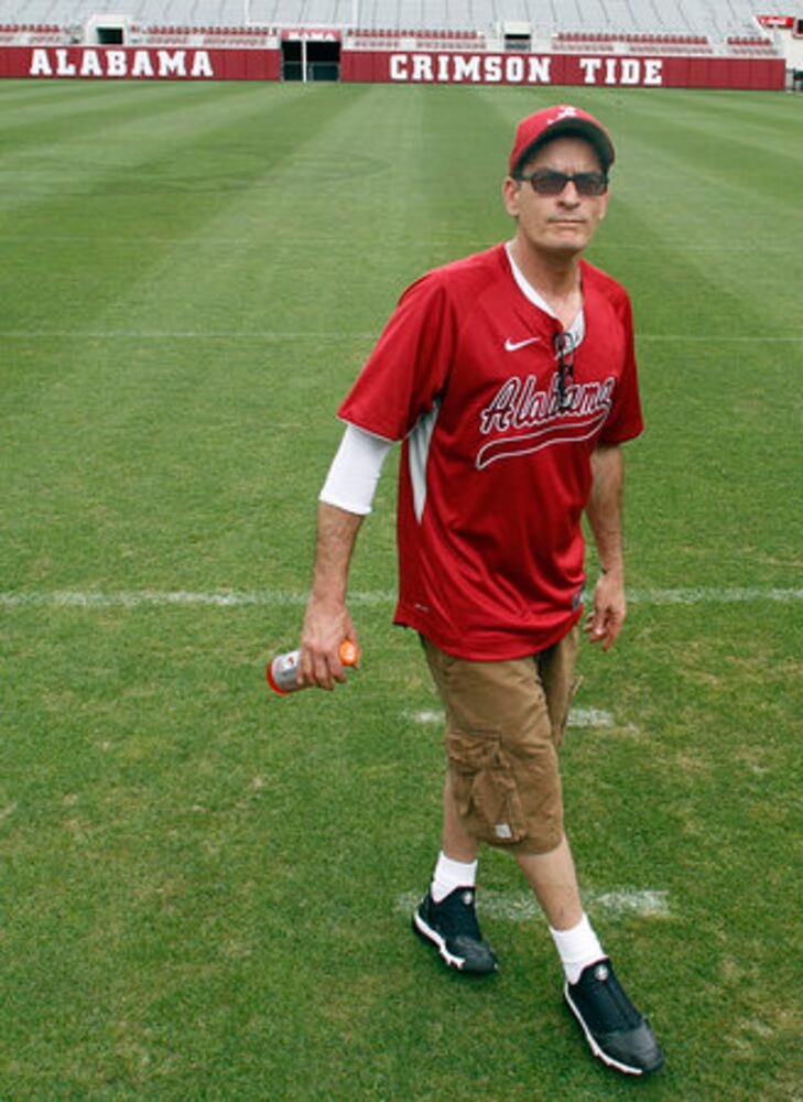 Charlie Sheen tours tornado damage in Alabama