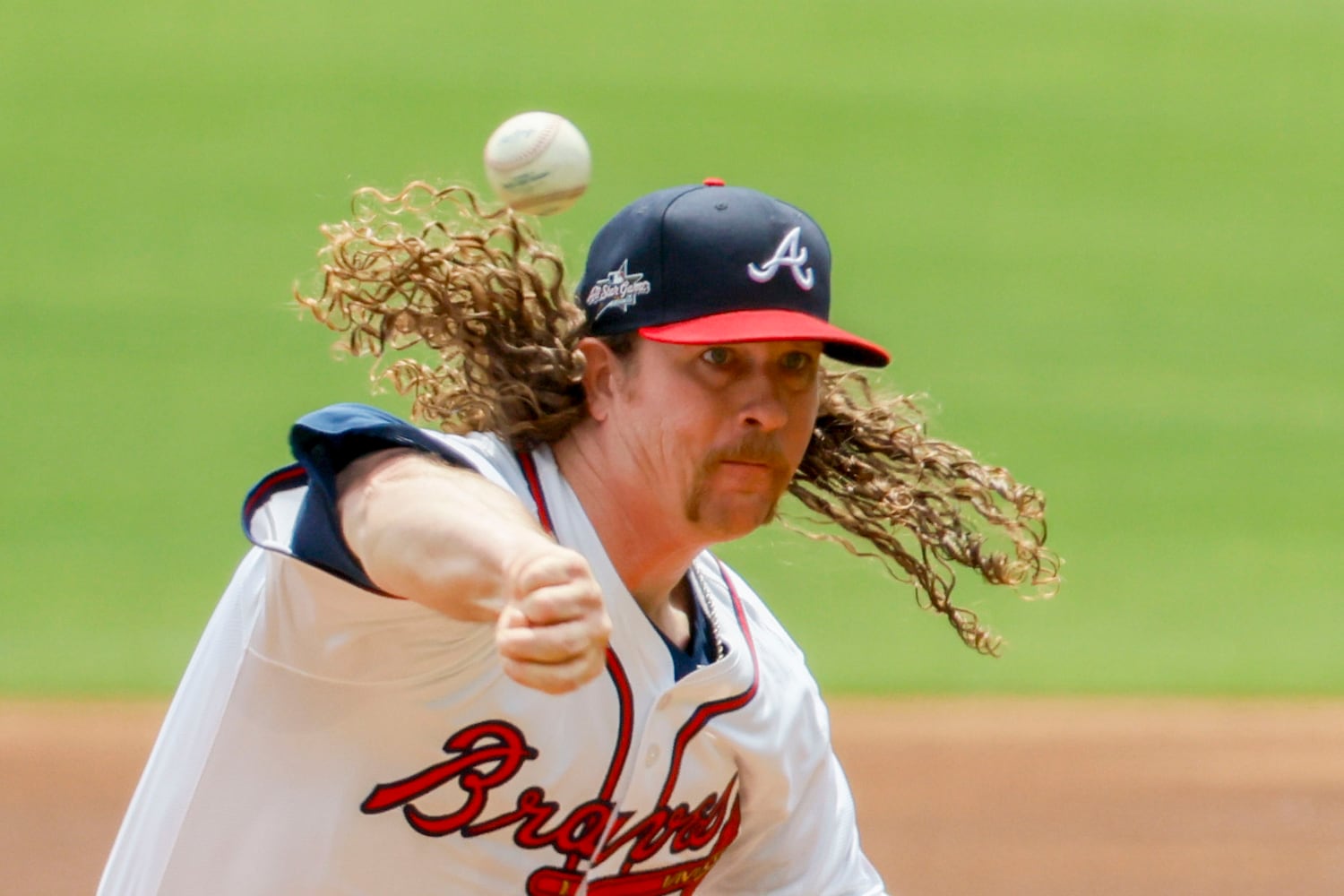 Braves starting pitcher Grant Holmes (66) throw a pitch to a Minnesota Twins batter during the first inning at Truist Park on Sunday, April 20, 2025, in Atlanta. 
(Miguel Martinez/ AJC)
