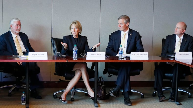 Then-U.S. Secretary of Education Betsy DeVos visited Georgia Tech in October 2018. An education researcher says a conservative cabal of billionaires, including DeVos, is using the courts and state legislatures to shape education policy in their favor. AJC FILE PHOTO.