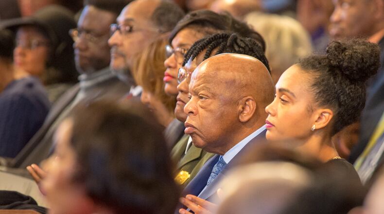 On Monday, U.S. Rep. John Lewis (center) at the annual Martin Luther King Jr. Day service at Ebenezer Baptist Church in Atlanta. Phil Skinner, for the AJC.