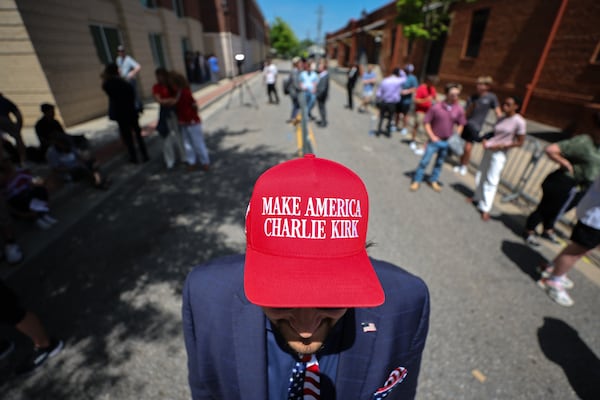 Anthony Maulucci poses for a photo while waiting in line at a Turning Point USA event in Athens on Tuesday. (Arvin Temkar/AJC)