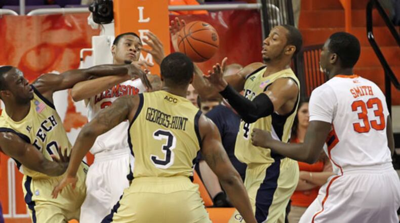 Georgia Tech and Clemson players try to come down with a rebound. The Jackets suffered their sixth consecutive loss to the Tigers.