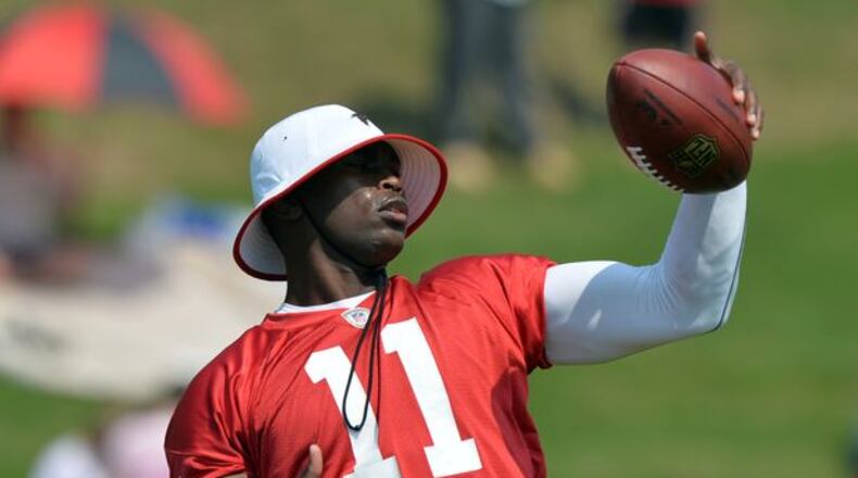 The Falcons could move quickly to get Julio Jones signed to a extension. He catching a pass at training camp in 2014. (BRANT SANDERLIN/BSANDERLIN@AJC.COM)