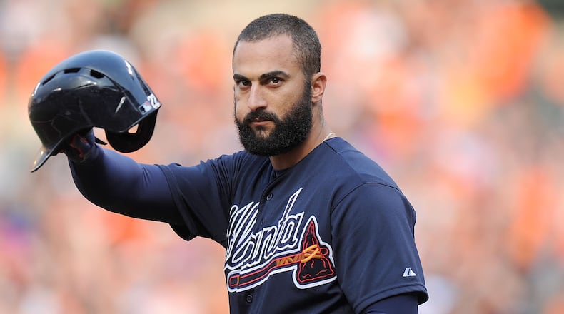 Braves outfielder Nick Markakis acknowledges the crowd in a his return to Oriole Park at Camden Yards in Baltimore in July 2017.